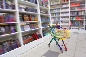 A shopping cart in a retail store that has retail store cleaniing services NYC.