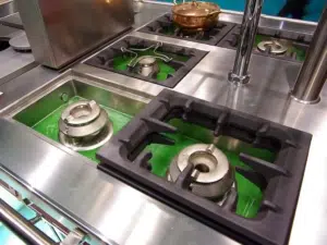 Clean commercial kitchen burners. Restaurant cleaning NYC.