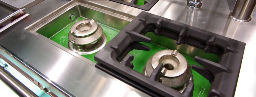 Clean kitchen burners at a restaurant.