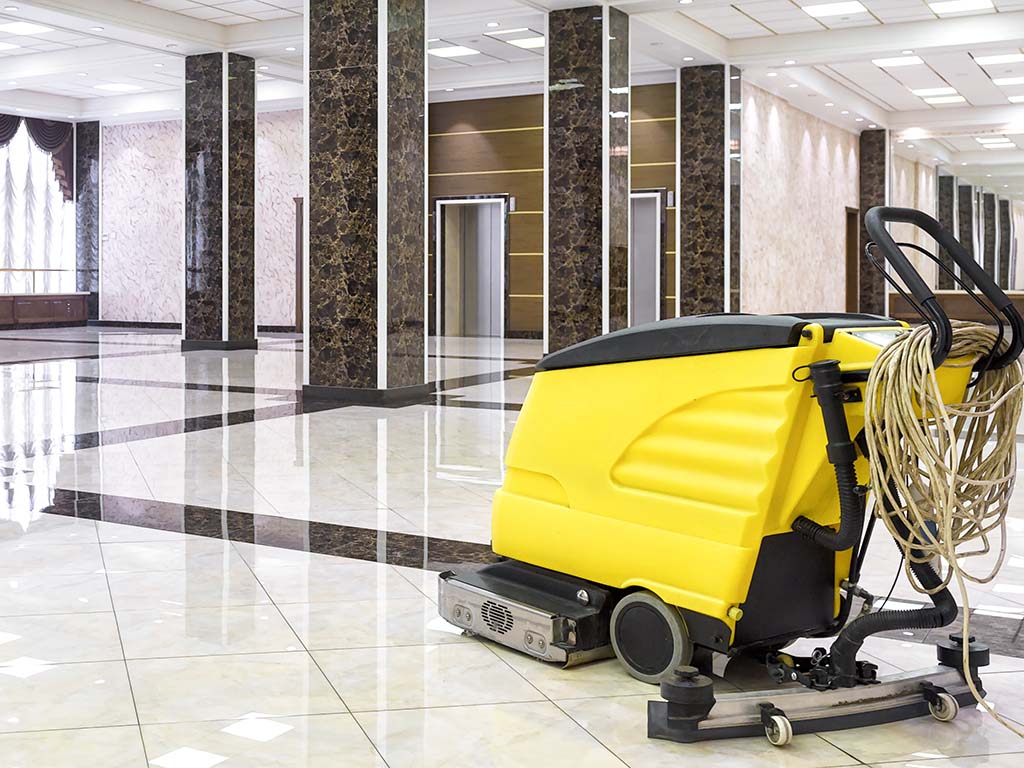NYC floor buffing machine cleaning a reception area at a Manhattan business.