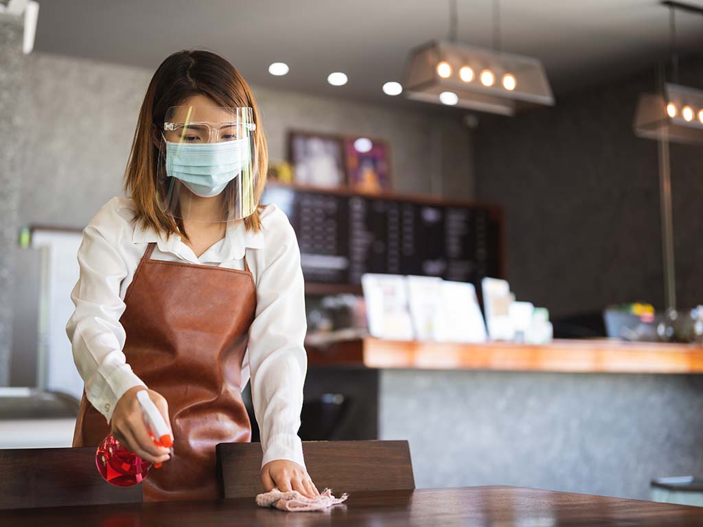 New York City cafe cleaning company following health code regulations during covid-19 pandemic.