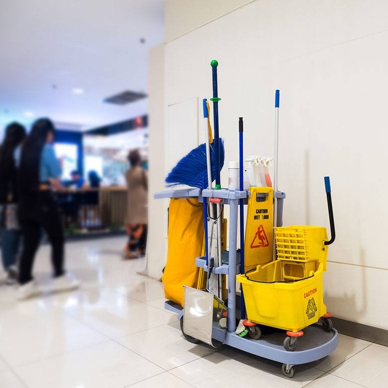 NYC office commercial deep cleaning supply cart outside of a high traffic area.
