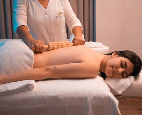Woman getting a massage in a spa. NYC Spa cleaning is a part of a good relaxation experience.