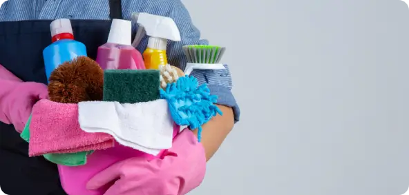 legal-compliance-office-security Cleaning staff carrying a basket of spray bottles and microfiber cloths for legal compliance office security and regular hygiene.